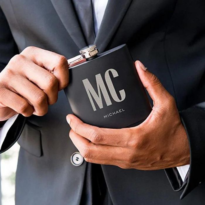 This personalized black flask is a unique wedding gift for brother